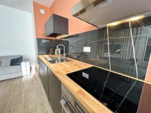 Appartements Le Bijou - Appartement, Sauna et Jacuzzi - Lille : photos des chambres