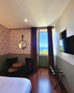 Hotels Hotel Restaurant Christophe Colomb : Chambre Quadruple - Vue sur Mer