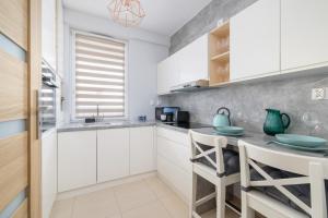 Osiedle Avia Harmonious Apartment with Balcony Cracow by Renters Prestige