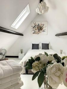 Appartements Le Odette - Campagne chic : photos des chambres