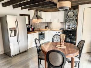 Appartements Le Odette - Campagne chic : photos des chambres