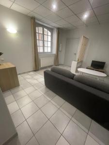 Appartements A deux pas de l’abbatiale : photos des chambres