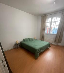 Appartements A deux pas de l’abbatiale : photos des chambres