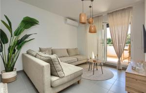 Awesome Apartment In Premantura With Kitchen