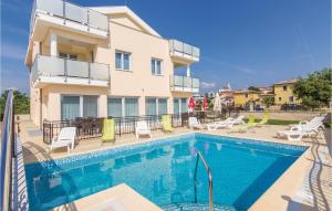 Awesome Apartment In Funtana With 1 Bedrooms, Outdoor Swimming Pool And Wifi