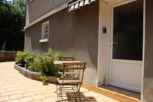 Appartements L'hortensia - Jardin - Cuisine equipee : photos des chambres