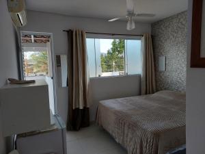 Suíte de praia na casa da Berenice