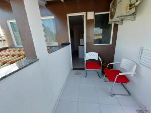 Suíte de praia na casa da Berenice