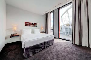 Junior Suite with Sauna, King Bed and Sofa Bed (4 Adults)  room in Hilton Garden Inn Stuttgart NeckarPark