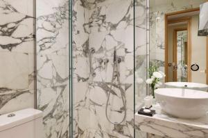 Superior Queen Room room in Le Belgrand Hotel Paris Champs Elysees Tapestry By Hilton