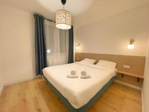 Appartements Les fauvettes - Centre ville : photos des chambres