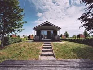 Beautiful holiday home with a veranda and jetty - Emmeloord
