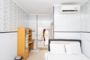 Alfa Guesthouse Serpong Mitra RedDoorz
