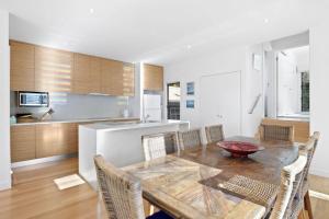 One At Seventy Seven