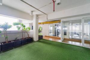 RedLiving Apartemen Grand Kamala Lagoon - Rooms 911 Tower Barclay South with Netflix