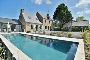 Maisons de vacances Les Roches Bleues - Climatisee avec piscine et jacuzzi : photos des chambres