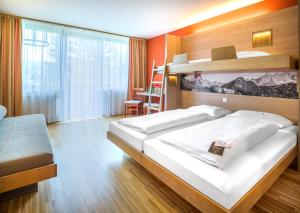 Superior Triple Room room in JUFA Hotel Altenmarkt-Zauchensee