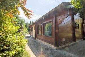Chalets Le Chant du Ruisseau SPA - Sauna : photos des chambres