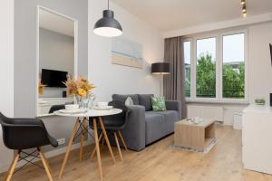 Wola Pet-friendly Apartments with AC Sławińska by Renters