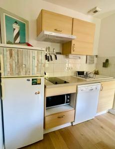 Bel appartement cosy dans résidence avec piscine 5 minutes plage