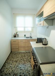 Explore Greece from Apartment with Private Garden