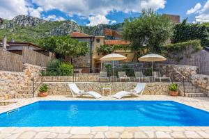 Villa Cocoon - Vacation Home with Heated Pool & Garden