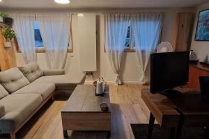 Appartements Maison Cosy Jacuzzi Privatif : photos des chambres