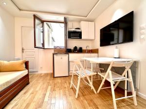 Appartements 2 pieces pres de Paris et stade France/4mins metro : photos des chambres