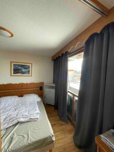 Appartements Chamrousse a 50m des pistes appart 4/6 : photos des chambres