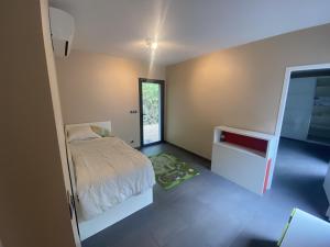 Maisons de vacances La Frontonnaise - Villa d'architecte Nord Toulouse : photos des chambres