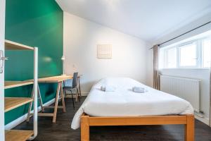 Appartements Entre Bastille et hyper-centre: lave-linge - fibre : photos des chambres