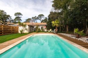 Maisons de vacances Landaise le lagunak avec piscine chauffee a 900 M de la plage : photos des chambres