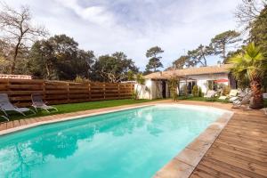 Maisons de vacances Landaise le lagunak avec piscine chauffee a 900 M de la plage : photos des chambres