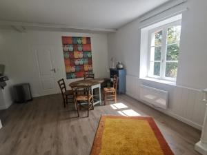 Appartements La petite maison rouge : photos des chambres