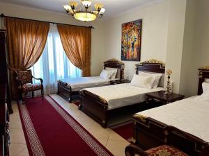 Triple Room room in Dinasty Hotel