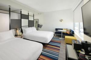 Queen Room with Two Queen Beds - Hearing Accessible room in Aloft Lubbock