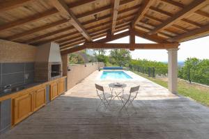 Maisons de vacances Rosa Gallica - Maison climatisee avec piscine : photos des chambres