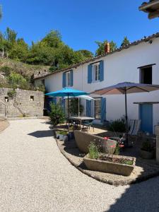 Maisons de vacances Au coeur de Charroux : photos des chambres