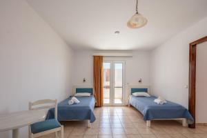 Family Room with Garden View room in Koni Village Hotel