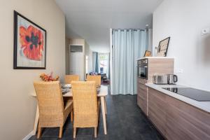 Appartements Le Jardin des Docks - Appt avec jardin : photos des chambres