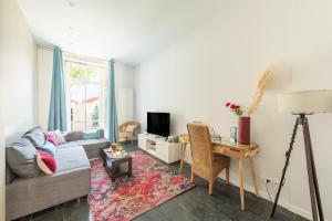 Appartements Le Jardin des Docks - Appt avec jardin : photos des chambres