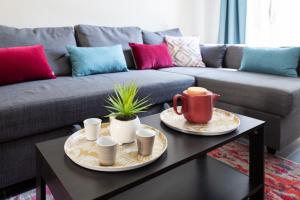 Appartements Le Jardin des Docks - Appt avec jardin : photos des chambres