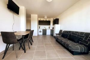 Appartements Esprit du Sud - Terrasse & Parking : photos des chambres