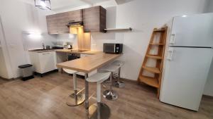 Appartements L'Ecrin de Saint Genest Lerpt - Belle vue et Calme : photos des chambres