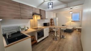 Appartements L'Ecrin de Saint Genest Lerpt - Belle vue et Calme : photos des chambres