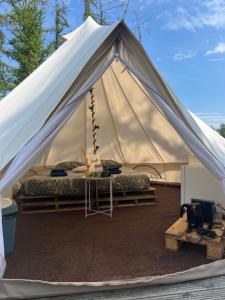 Glamplodge met privé sanitair