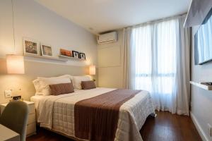 Flat com varanda, vista mar e Cristo