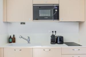 Appartements Dans l'ancien Grand Hotel charmant studio : photos des chambres