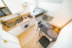 Appartements Le petit Californie - Joli studio renove -Oullins : photos des chambres