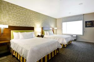 Queen Studio with Two Queen Beds - Mobility Access/Non-Smoking room in Home2 Suites by Hilton Dallas Downtown at Baylor Scott & White